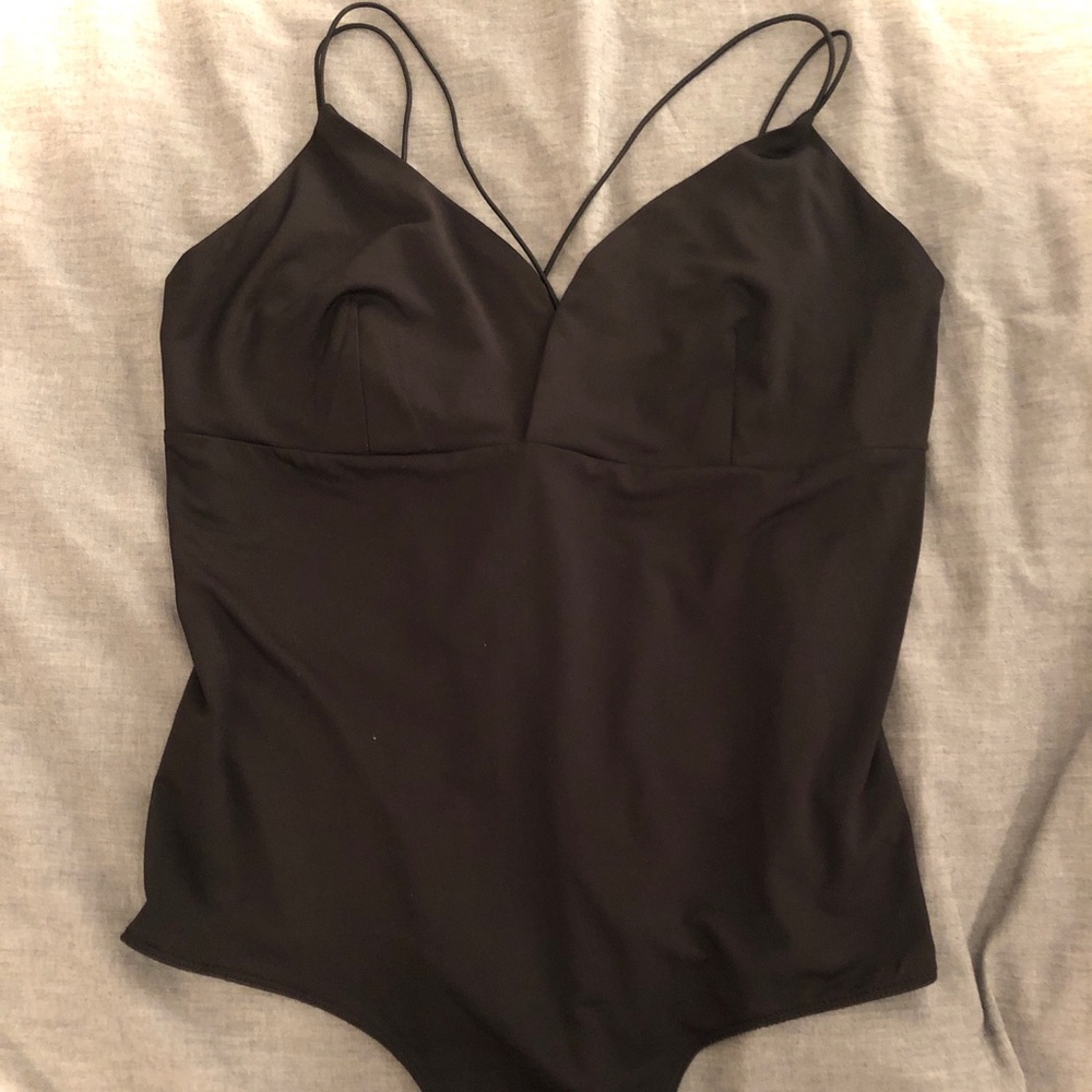 Black stretchy bodysuit with crisscross straps